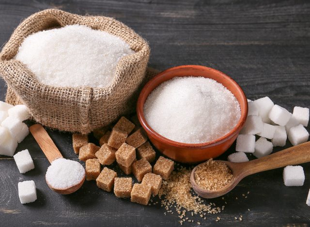 Different sugar on dark table