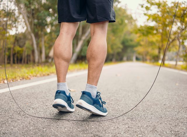 man skipping with jump rope in the park.