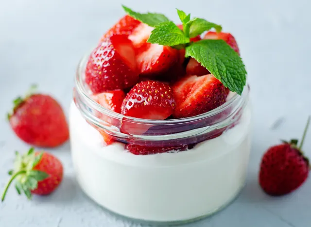 Greek yogurt strawberry parfaits with fresh berries. toning. selective focus
