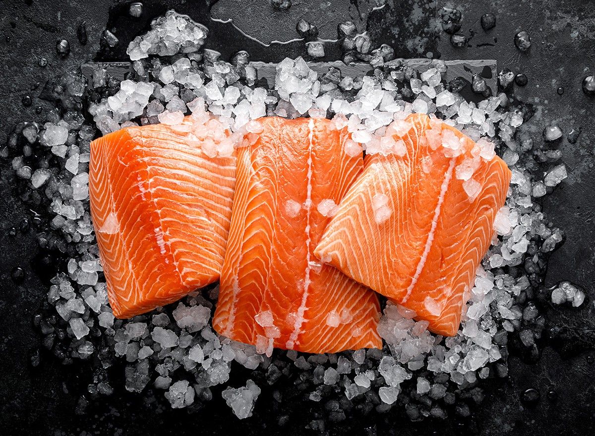 Salmon fillet. Slices of fresh raw salmon fish on ice