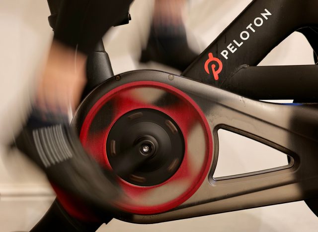 READING, UK - DECEMBER 25, 2021: Feet pedalling on a Peloton Bike in Reading, Berkshire, UK.