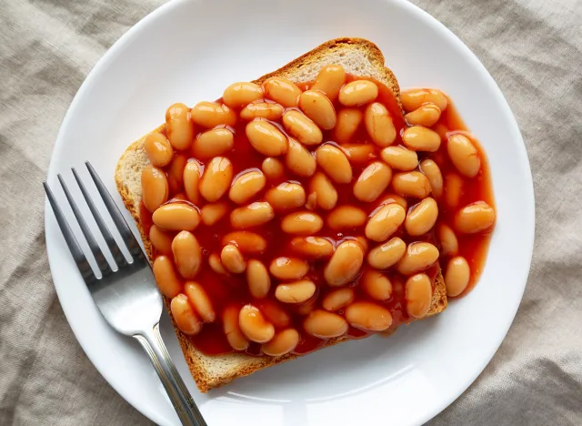 Delicious English Beans on Toast, top view. Flat lay, overhead, from above. Close-up.