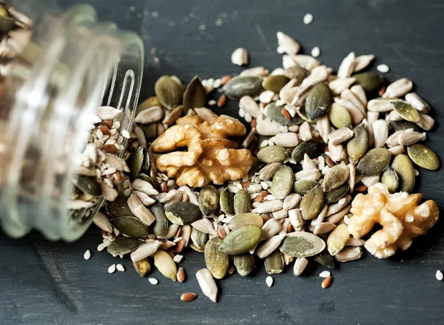 Various seeds , nuts seeds , pumpkin seeds and varies in glass jar