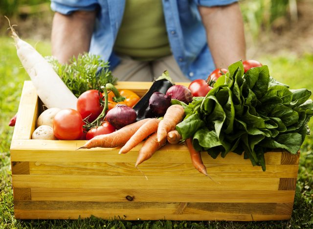 Wooden box filled fresh vegetables