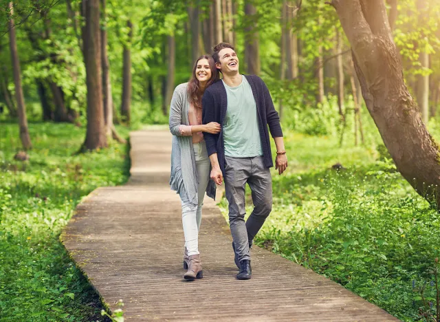 Young couple strolling in the park