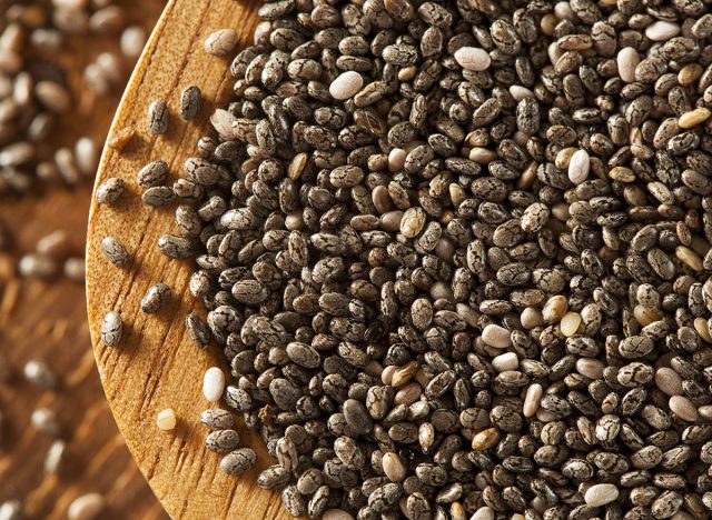 Organic,Dry,Black,And,White,Chia,Seeds,Against,A,Background