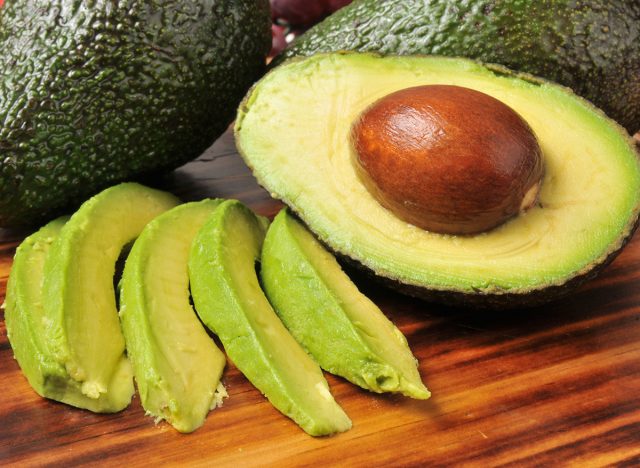 Sliced avocado on a cutting board