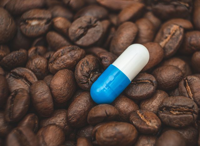 caffeine supplements. pill on the background of coffee beans.