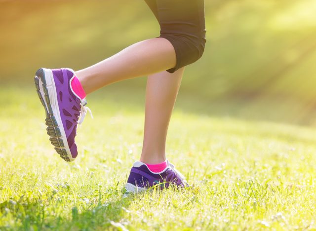 Woman running outdoors in morning