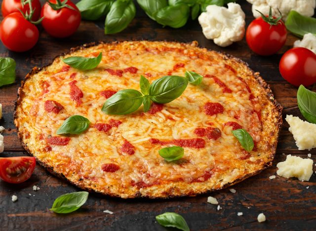 Cauliflower crust pizza with tomato sauce, cheese and basil. Healthy diet food