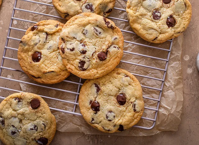 Chocolate chip cookies with flaky salt on a cooling rack, homemade freshly baked cookies