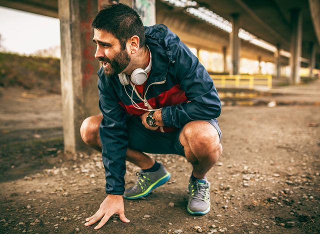 Exhausted man resting after jogging