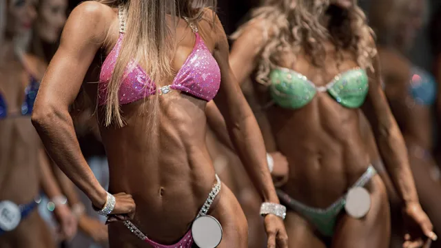 Beauty contest. Fitness bikini contest. Sexual woman's body.