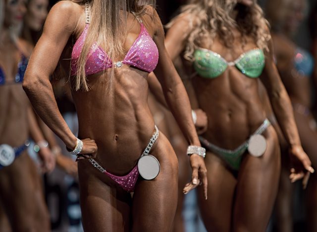 Beauty contest. Fitness bikini contest. Sexual woman's body.