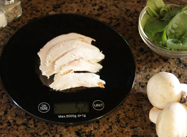 Chicken Breast on Food Scale with Mushrooms and Spinach