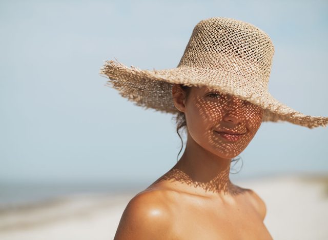 Beach Woman in Sun Hat on Vacation