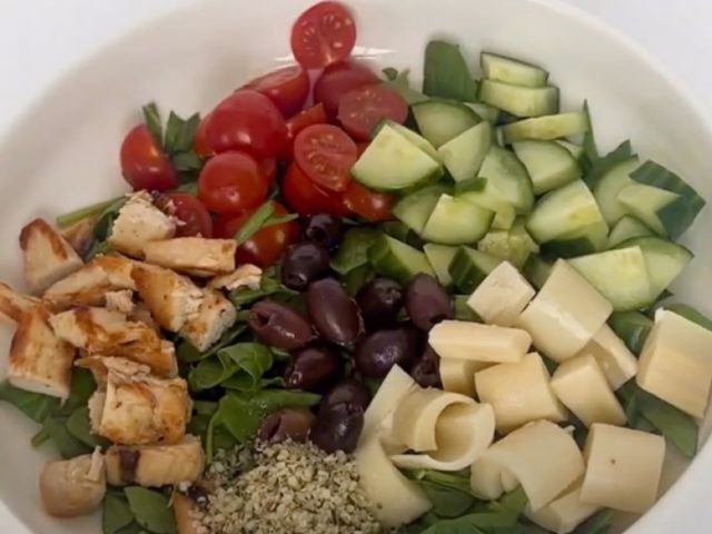 Chicken salad with tomatoes, cucumber and pal hearts.