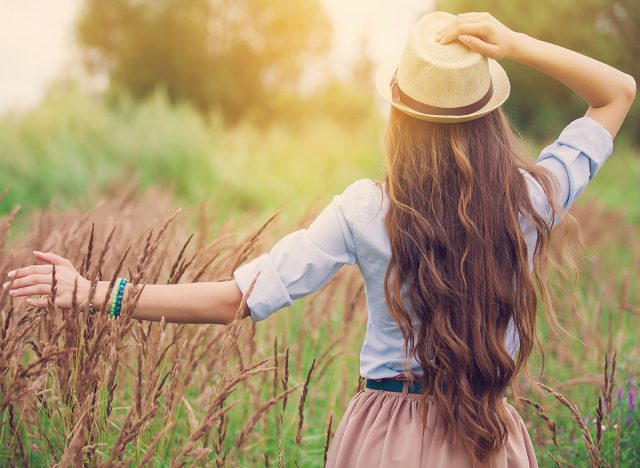 Beauty young girl outdoors enjoying nature