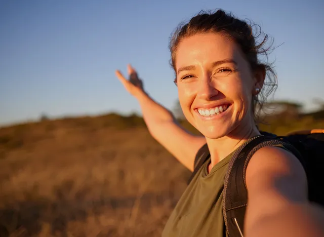 I want to share my journey with everyone. Shot of a young woman taking a selfie while out hiking.