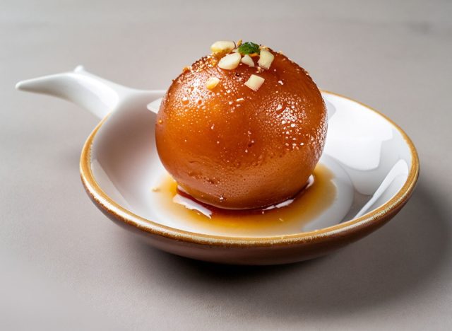 Tempting Indian Gulab jamun Presented In A Plate