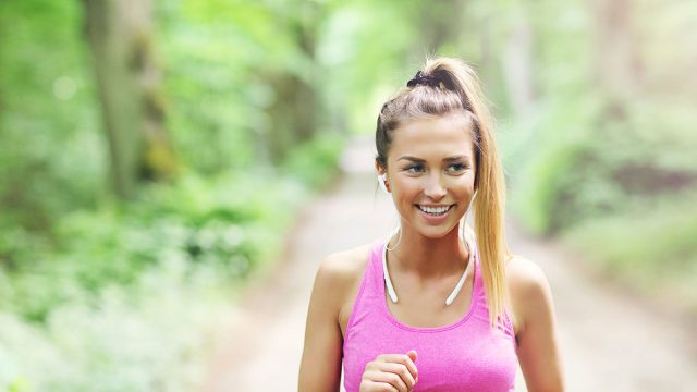 Woman jogging in the forest