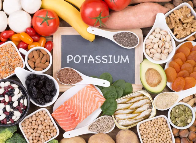 Food rich in potassium, top view with a small blackboard
