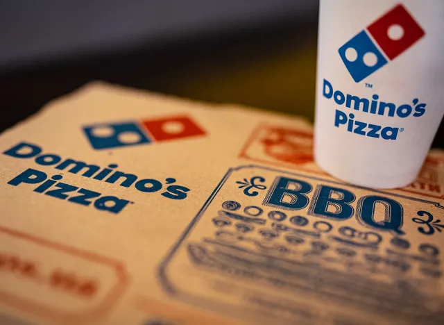 KIEV, UKRAINE - MAY 2019: Domino's Pizza Box detail. Domino's, is an American pizza restaurant chain founded in 1960, in 2018 the chain became the largest pizza seller worldwide in terms of sales.