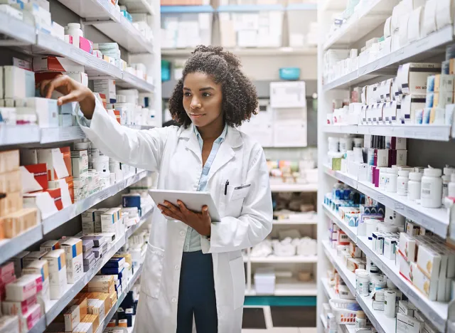 Never fear, your pharmacist is here. Cropped shot of an attractive young female pharmacist working in a pharmacy.