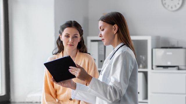 Medicine,,Healthcare,And,People,Concept, ,Female,Doctor,With,Tablet