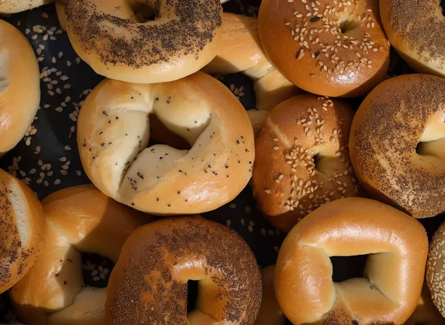 Bagel closeup isolated on background. display, whole and side view. frontal full view. lifestyle studio shoot. closeup view. flat lay