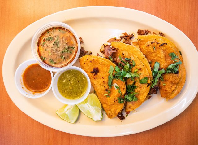 Hot Birria Tacos on white plate