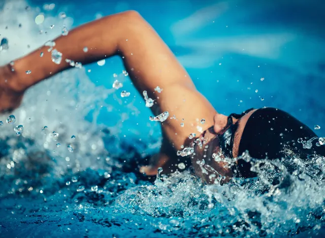 Female swimming front crawl.