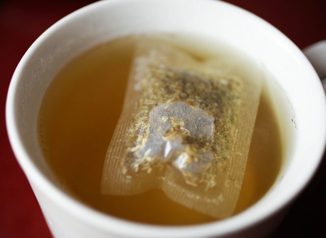 Hot chamomile green tea from bag in a cup.