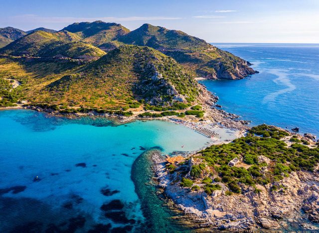 Cost of Sardinia: Peninsula of Punta Molentis. View of beautiful beach at Punta Molentis, Villasimius, Sardinia, Italy. Beautiful bay with sandy beach at Punta Molentis, Sardinia island, Italy.