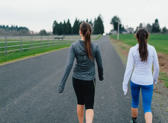 Running Women walking in Country