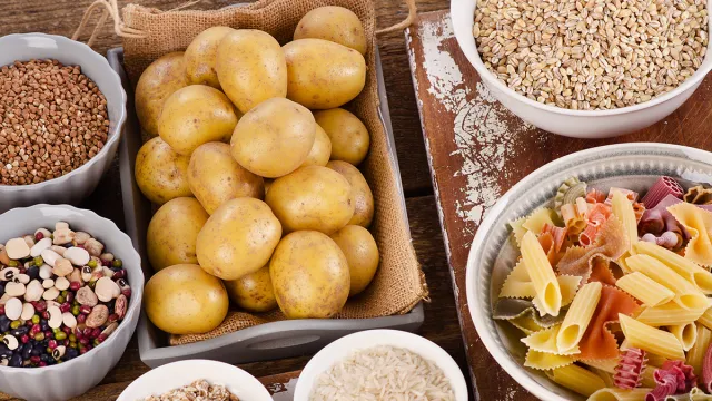 Healthy Food: Best Sources of Carbs on a wooden table. Top view