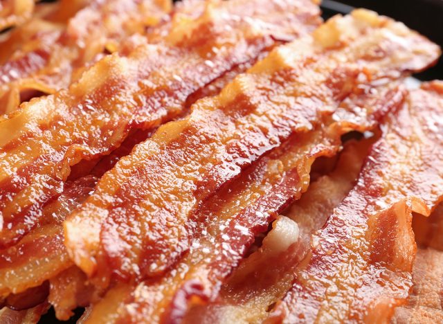 Fried bacon slices, closeup