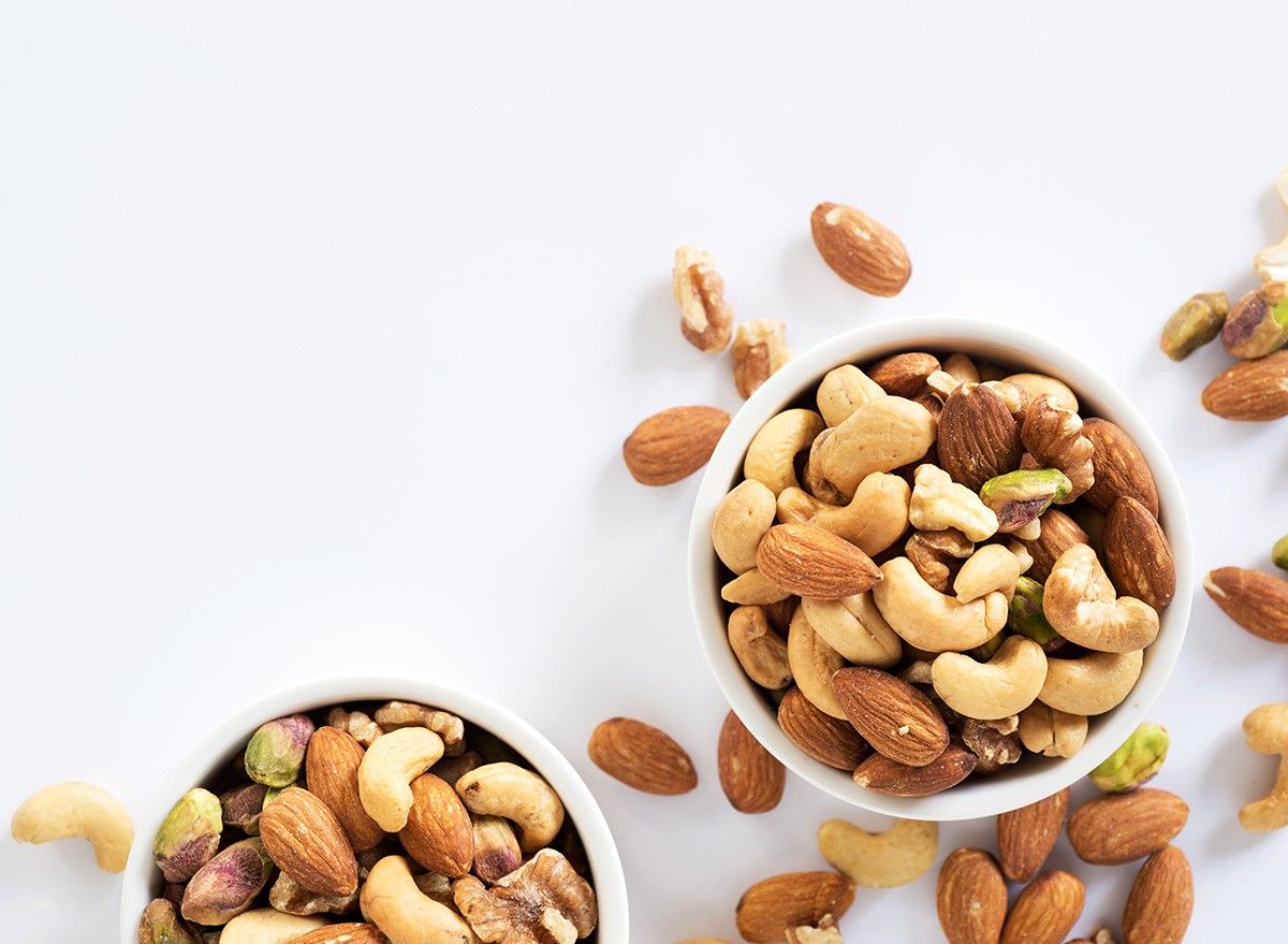 mixed nuts in white ceramic bowl