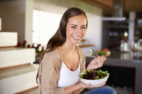 Salad, portrait and happy woman a house with breakfast, bowl or lettuce.