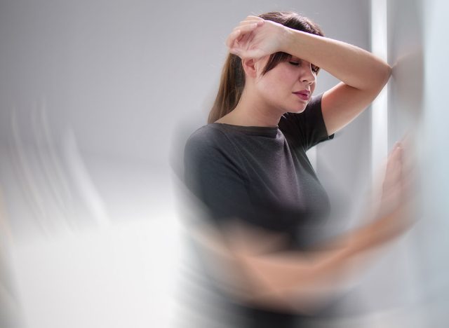 Dizzy Woman With Balance Loss. Vertigo Disorder