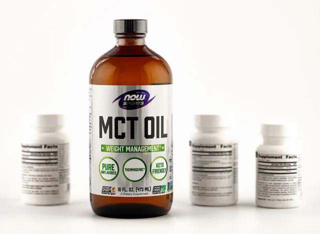 Novosibirsk,Russia - July, 16 - 2021: mct oil in the bottle. dietary supplement editorial photo