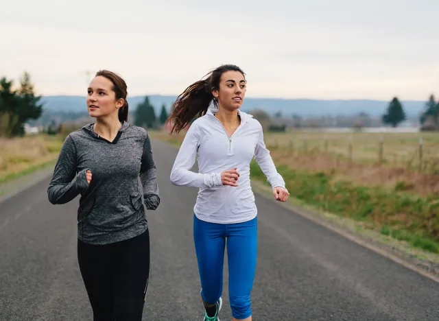 Running Women Jogging in Country