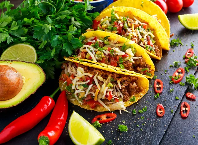 Mexican food - delicious taco shells with ground beef and home made salsa