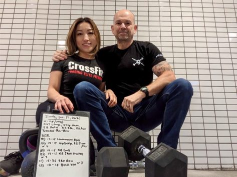 Couple posing at the gym