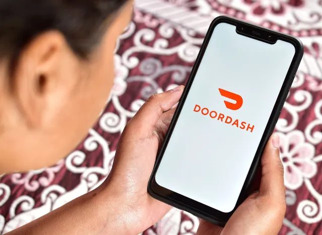 New Delhi, India - february 07, 2020: using doordash app for online food ordering