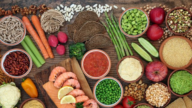 Diabetic health food low on glycemic index with foods high in protein, omega 3, antioxidants, fibre, vitamins, minerals and anthocyanins. All foods below 55 on GI index. Health care concept. Top view.