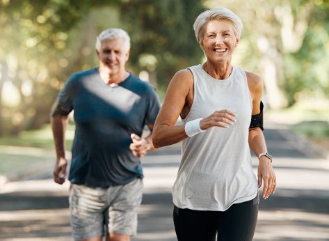 Retirement, couple and running fitness health for body and heart wellness with natural ageing. Married, mature and senior people enjoy nature run together for cardiovascular vitality workout.