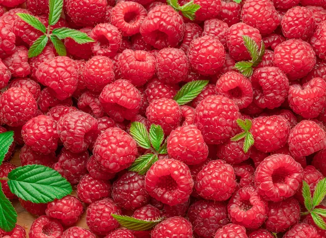 Fresh red ripe raspberries. Raspberries background.