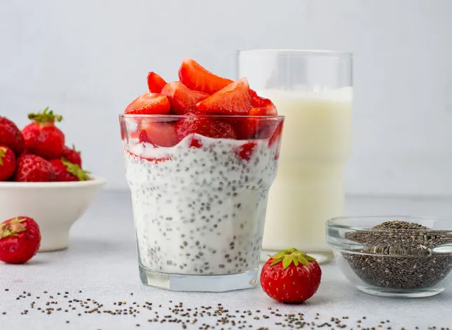 Chia pudding made from yogurt, chia seeds and strawberries on a light background, horizontal. Useful, healthy eating, diet, self-care. A healthy, easy dessert for breakfast.