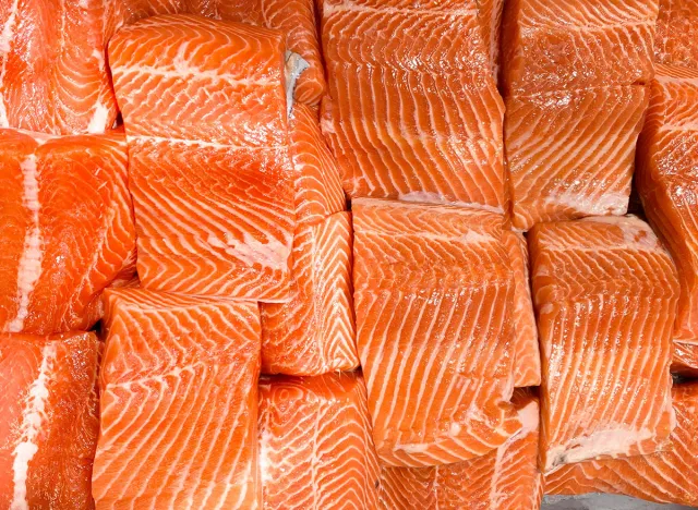 Top view of salmon fillet display for selling in wet market